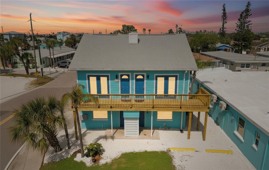 13343 Gulf Boulevard, Unit C9 Madeira Beach, FL 33708 - Photo 17 of 17 a aerial view of a house