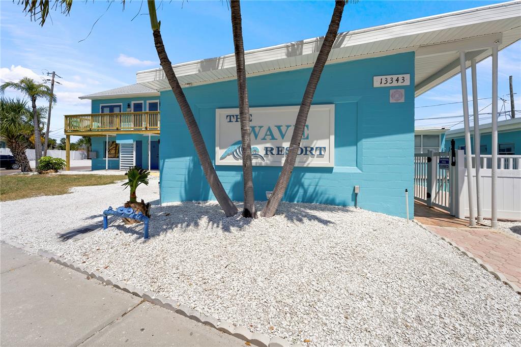 13343 Gulf Boulevard, Unit C9 Madeira Beach, FL 33708 - Photo 2 of 17 a view of a park with brick walls