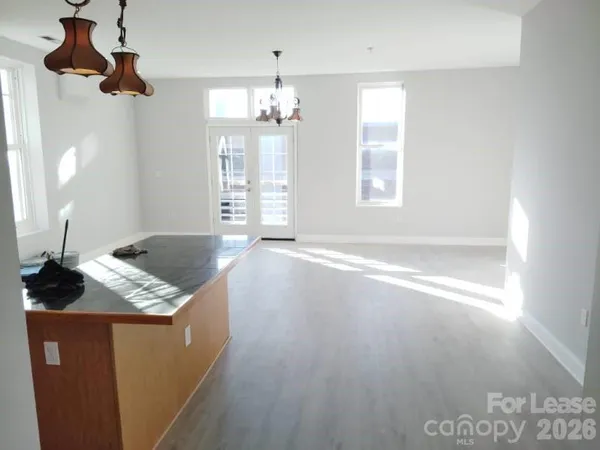 a view of kitchen and windows