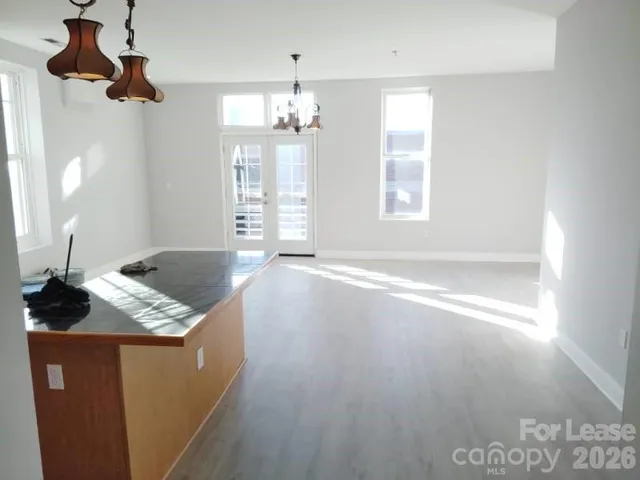 a view of kitchen and windows
