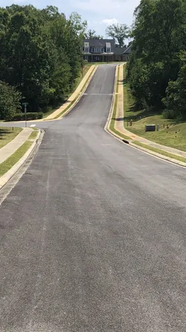 a view of a swimming pool with an outdoor space