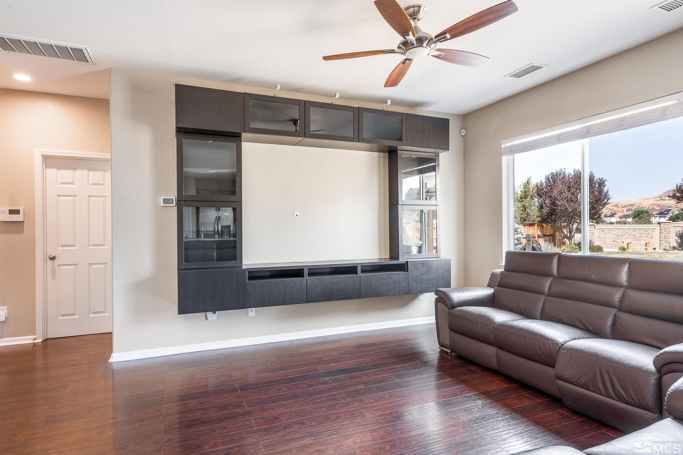 1955 Black Drive Reno, NV 89521 - Photo 10 of 40 a living room with furniture and a large window