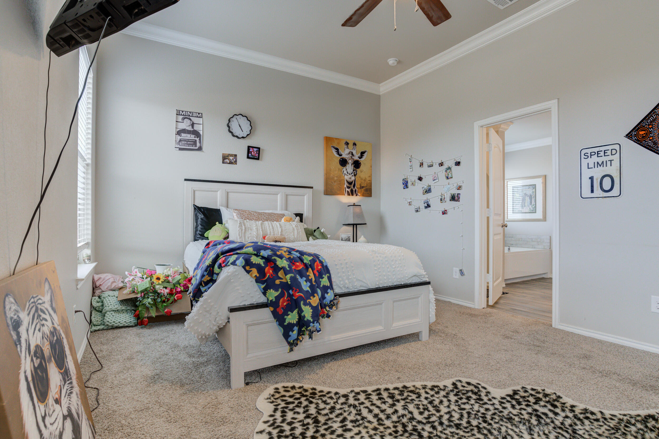 6818 40th Street Lubbock, TX 79407 - Photo 21 of 43 a bedroom with bed and furniture
