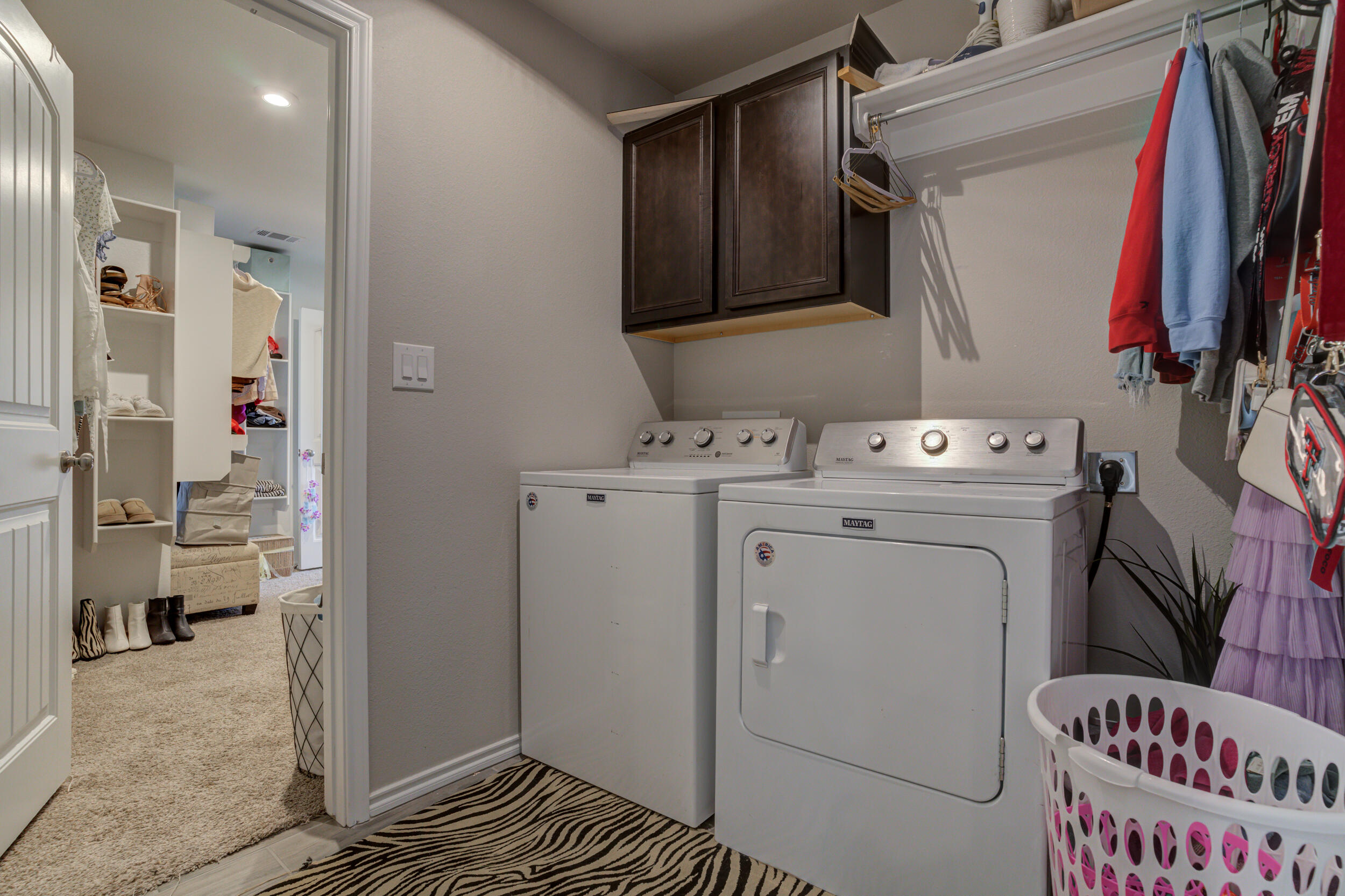 6818 40th Street Lubbock, TX 79407 - Photo 33 of 43 a view of walk in closet