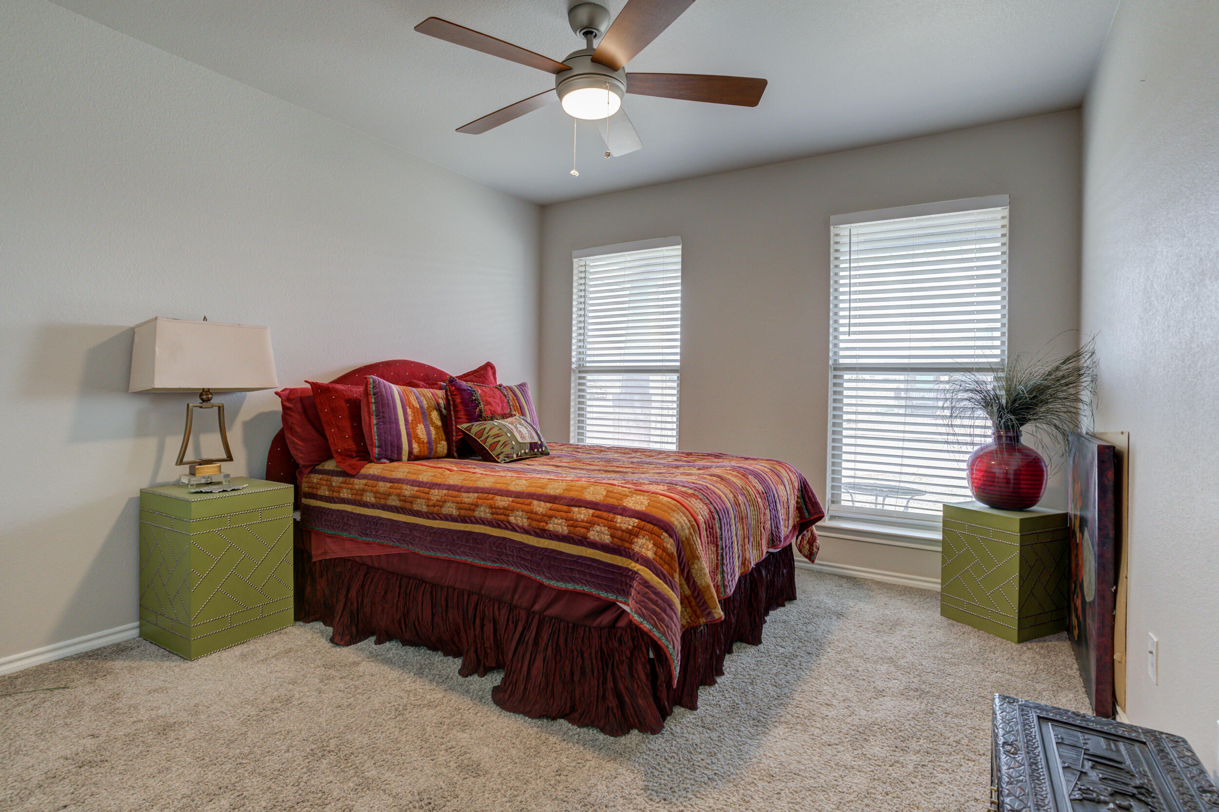 6818 40th Street Lubbock, TX 79407 - Photo 37 of 43 a bedroom with a bed and window