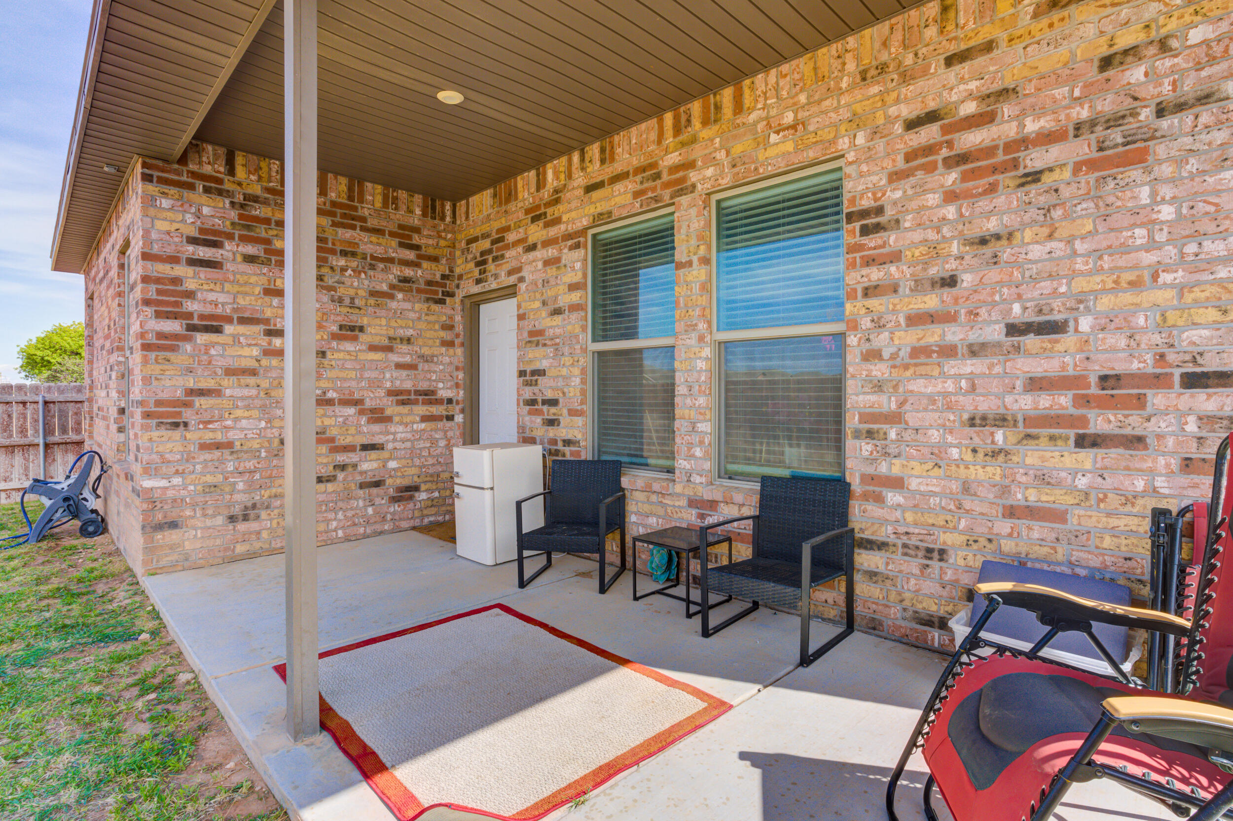 6818 40th Street Lubbock, TX 79407 - Photo 40 of 43 a outdoor space with chairs