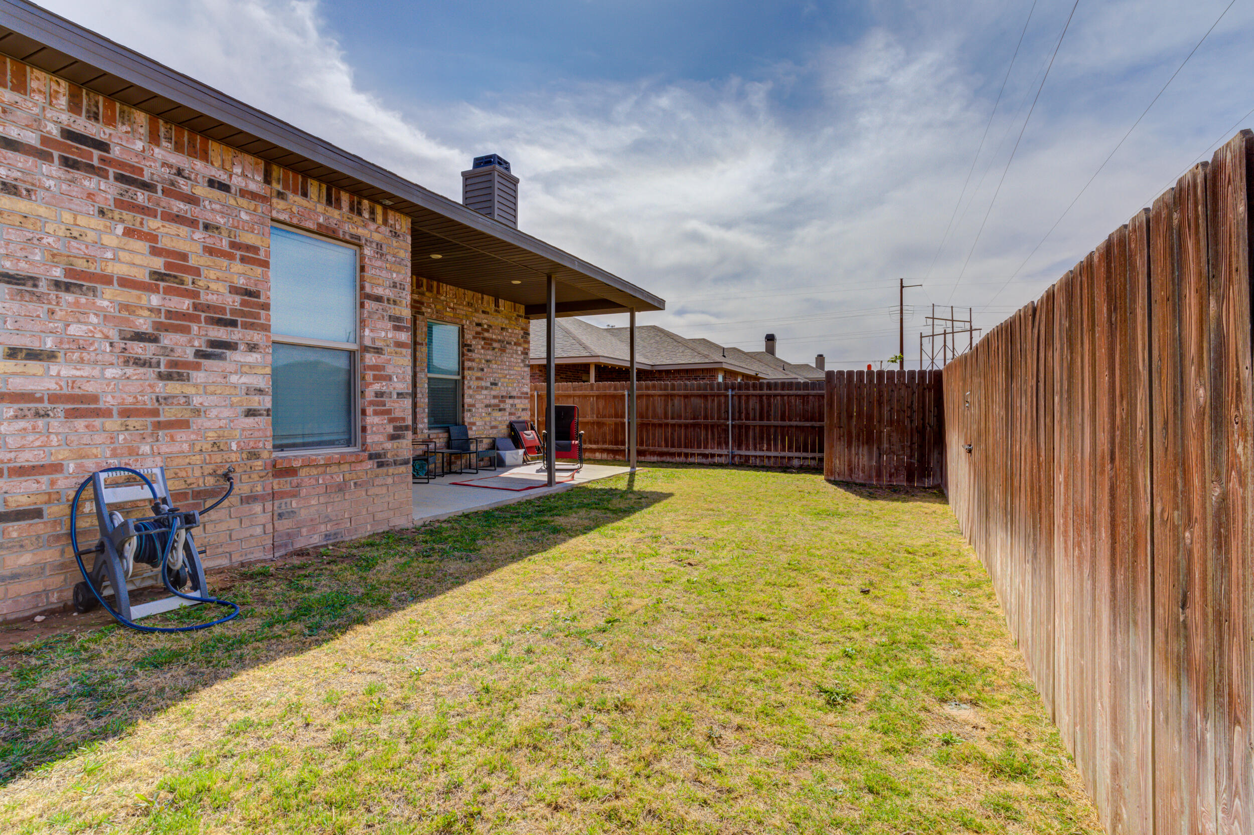 6818 40th Street Lubbock, TX 79407 - Photo 41 of 43 a view of a backyard with garden