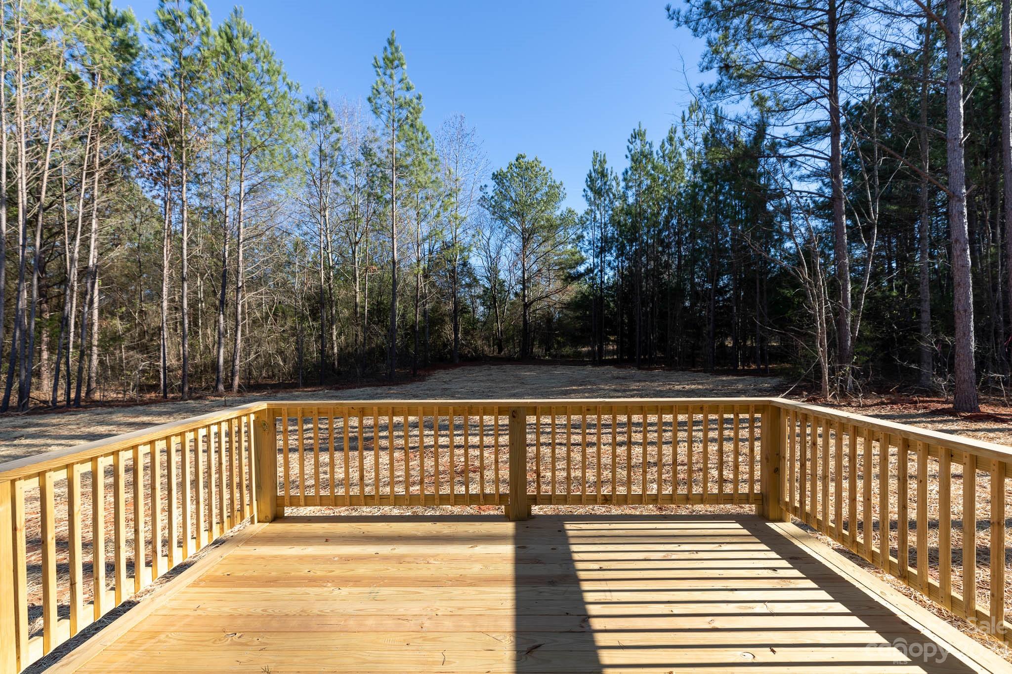 4434 Culp Road Edgemoor, SC 29712 - Photo 13 of 36 a view of a balcony with wooden floor