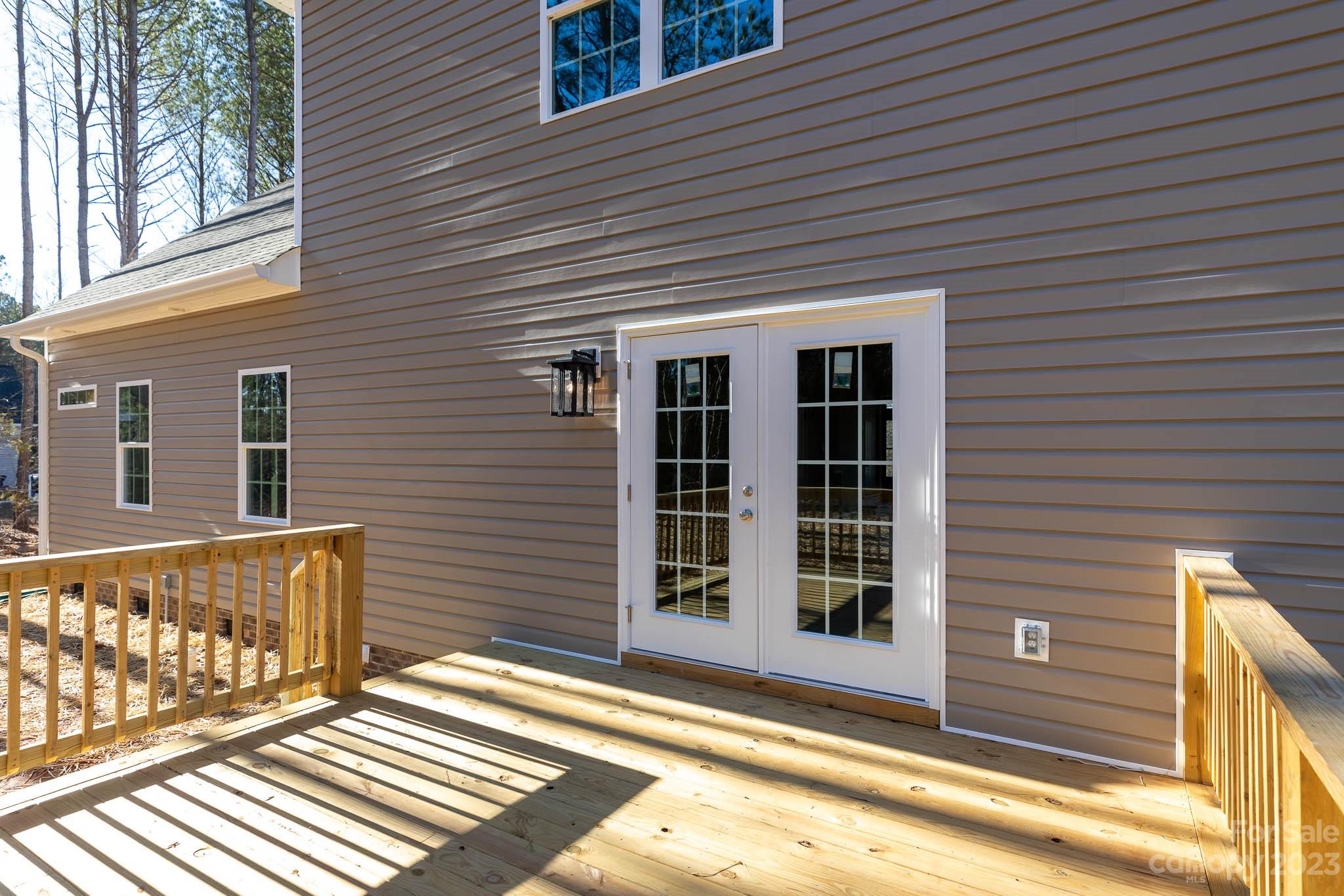 4434 Culp Road Edgemoor, SC 29712 - Photo 14 of 36 a view of a brick house with large windows