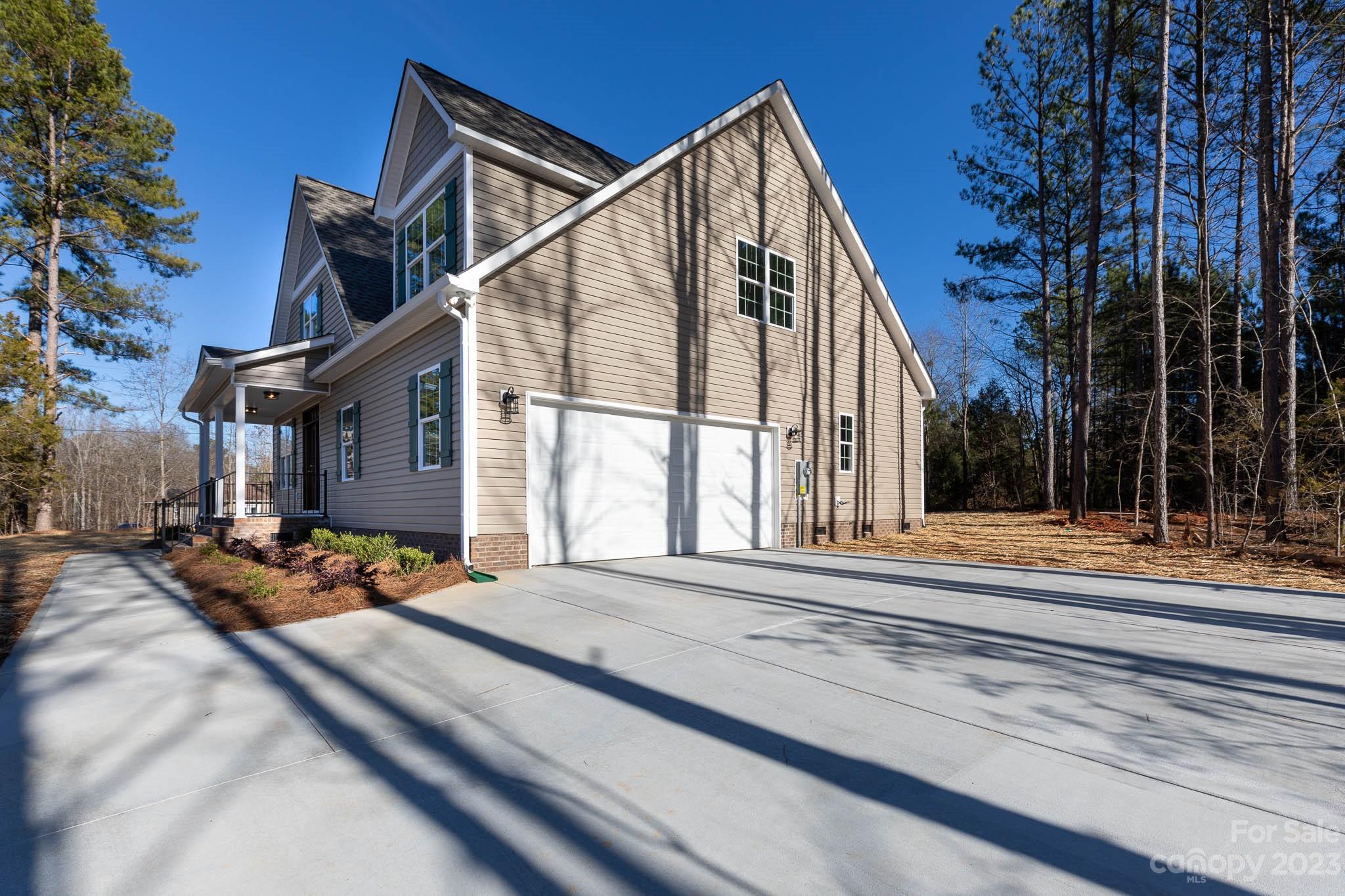 4434 Culp Road Edgemoor, SC 29712 - Photo 2 of 36 a view of house with backyard porch and outdoor seating