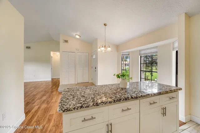 a bathroom with sink and mirror