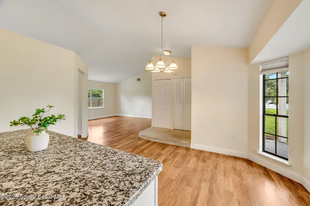 a view of a living room and a window