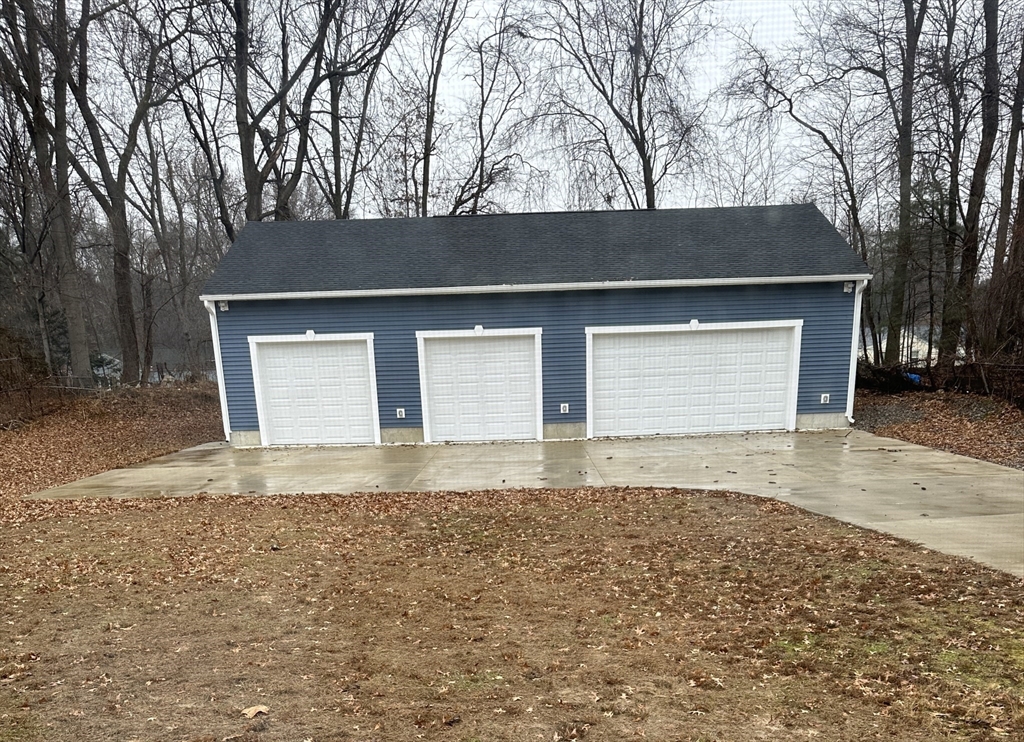 19 Meadowbrook Road Agawam, MA 01001 - Photo 2 of 8 front view of a house with a yard