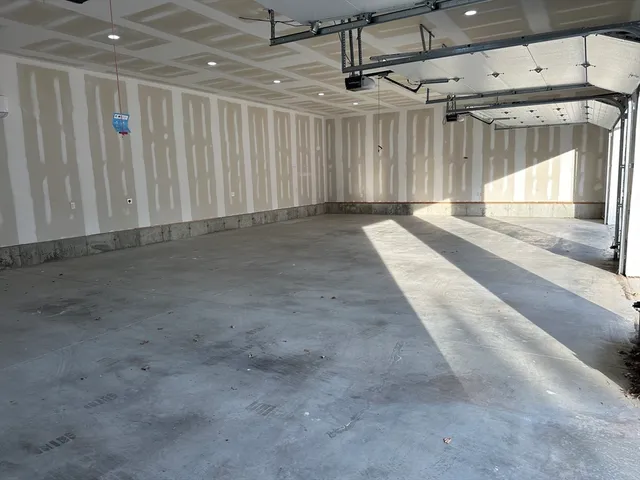 a view of a room with a garage