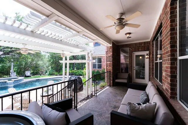 a view of a porch with furniture