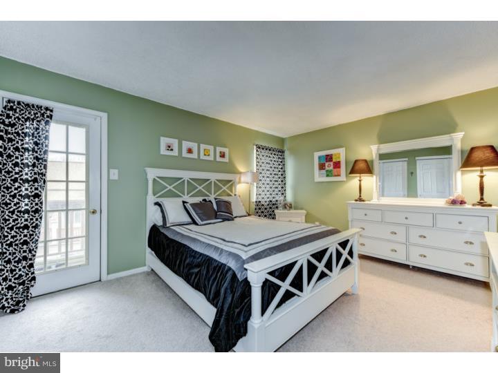 306 Paddock Drive Chesterbrook, PA 19087 - Photo 11 of 16 a bedroom with a bed and a dresser