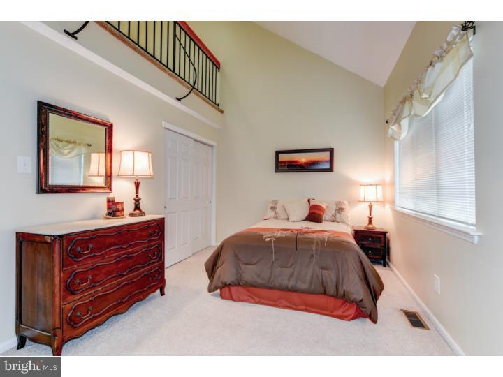 306 Paddock Drive Chesterbrook, PA 19087 - Photo 15 of 16 a bedroom with a bed and a dresser
