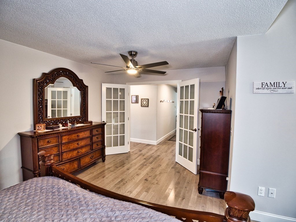 805 Warren Street Fall River, MA 02721 - Photo 23 of 41 a living room with furniture and wooden floor