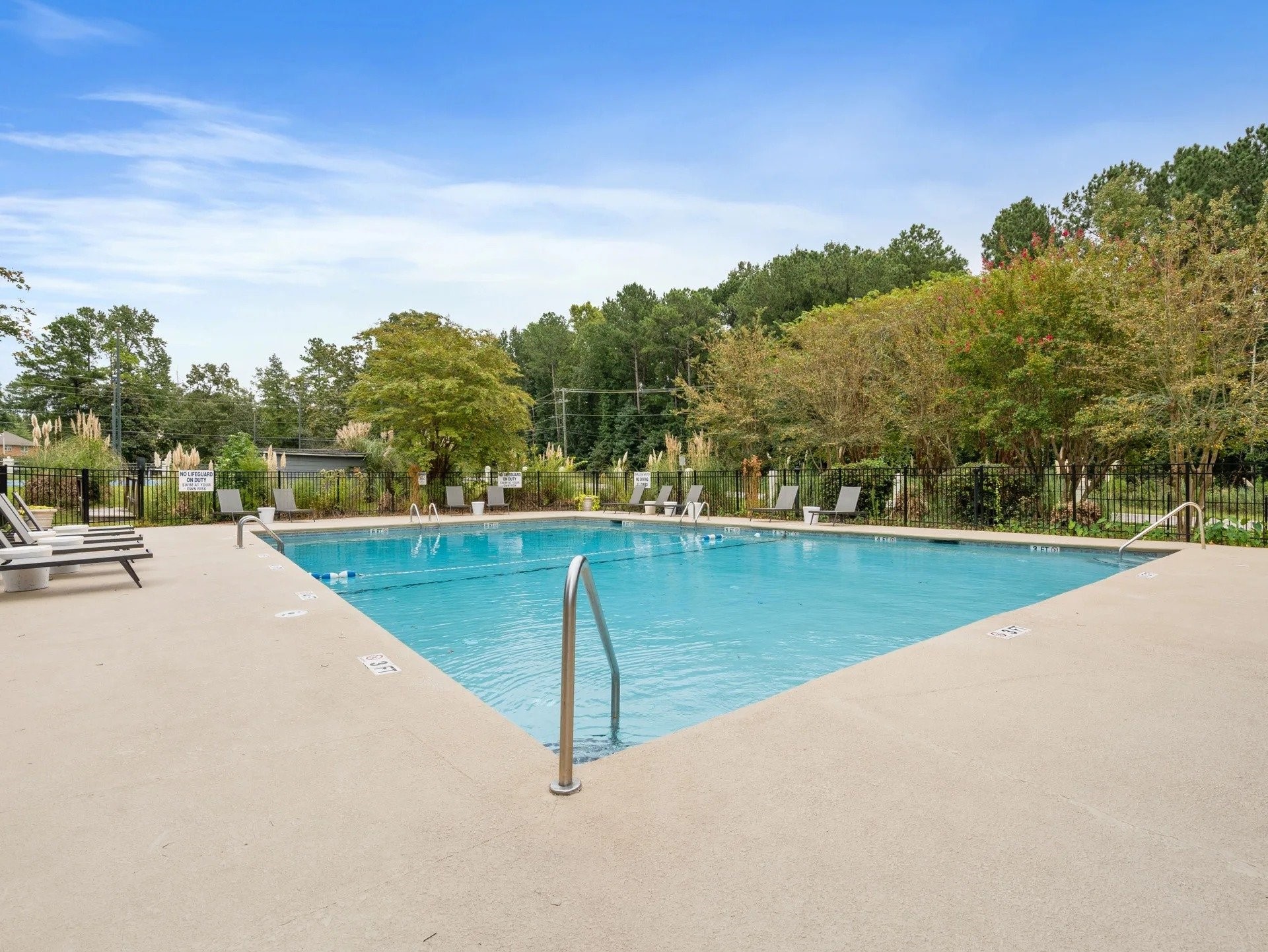 501 Pelham Drive Columbia, SC 29209 - Photo 7 of 23 a view of a swimming pool and trees in the background
