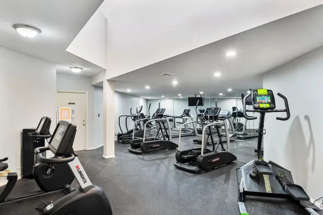 a view of a room with gym equipment