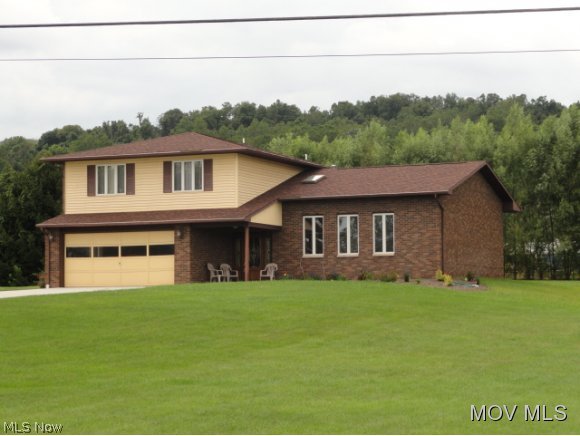 1095 Joe Skinner Road Belpre, OH 45714 - Photo 1 of 24 side