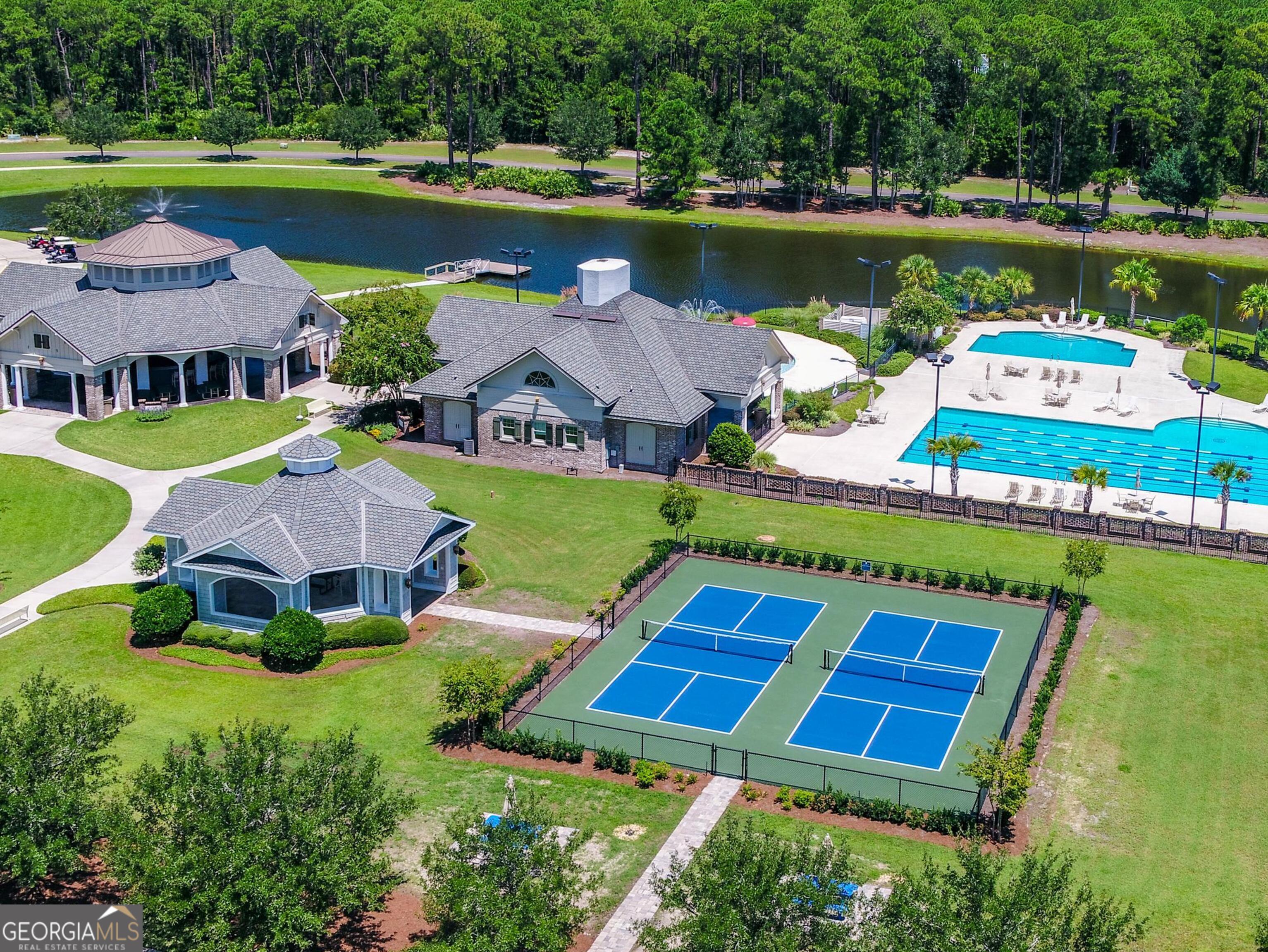 V/l 1028 Becket Road Kings Bay, GA 31558 - Photo 5 of 12 an aerial view of a house with garden space and a swimming pool