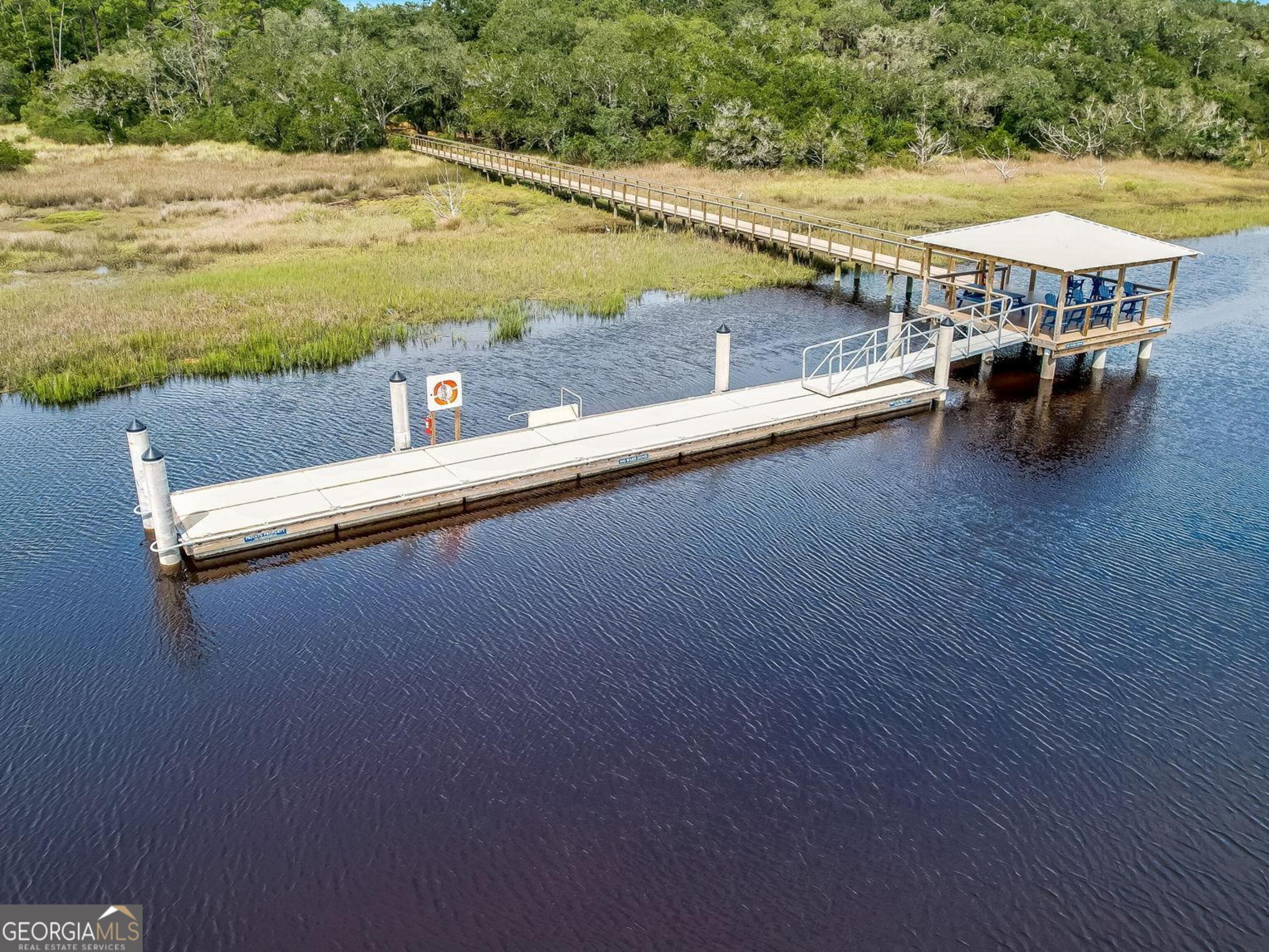 V/l 1028 Becket Road Kings Bay, GA 31558 - Photo 10 of 12 a view of swimming pool with outdoor seating and ocean view