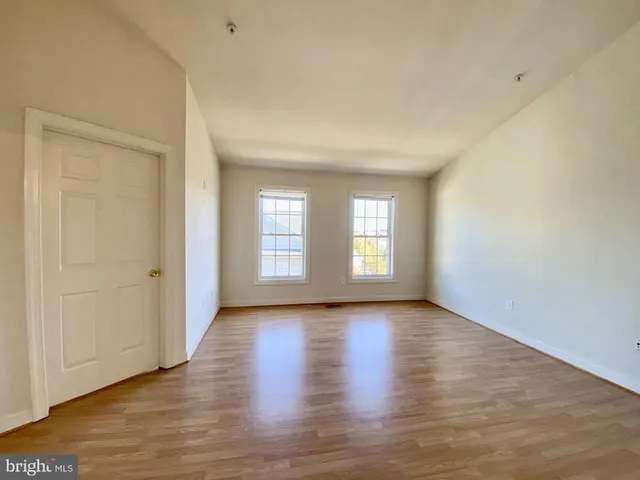 a view of a room that has a window in it