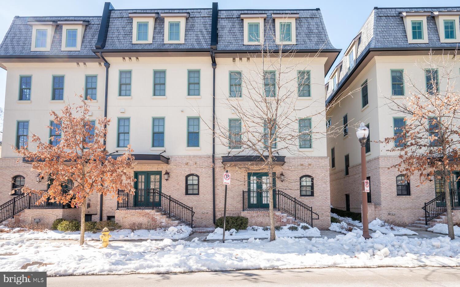 1126 North Stuart Street Arlington, VA 22201 - Photo 2 of 38 a large building with a street