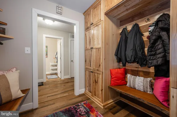 a workspace with furniture and a book shelf