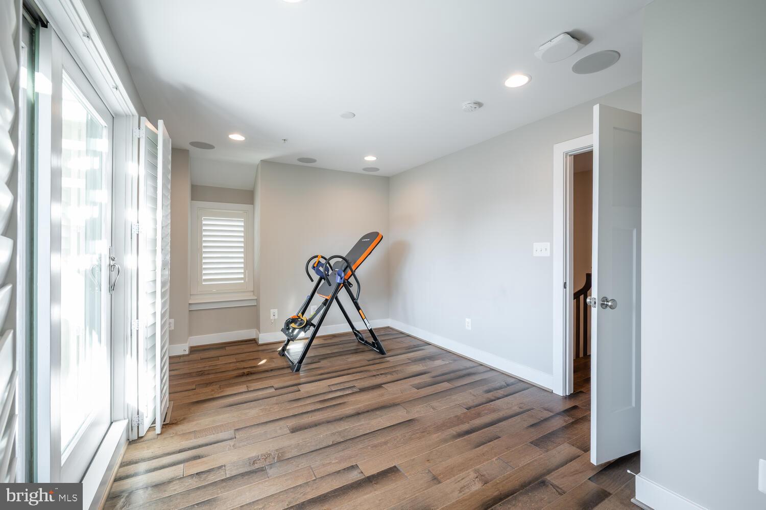 1126 North Stuart Street Arlington, VA 22201 - Photo 38 of 38 a view of a room with wooden floor and windows