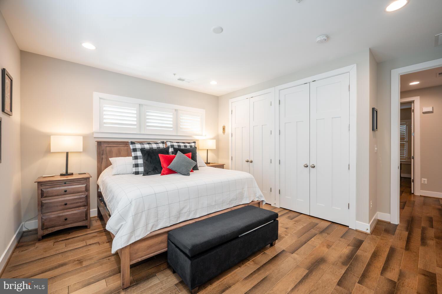 1126 North Stuart Street Arlington, VA 22201 - Photo 5 of 38 a bedroom with a bed and a night stand
