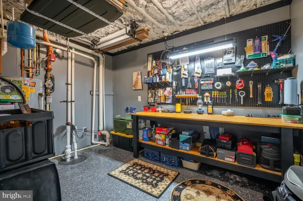 a room with lots of different kinds of flowers