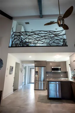 a kitchen with a stove and cabinets