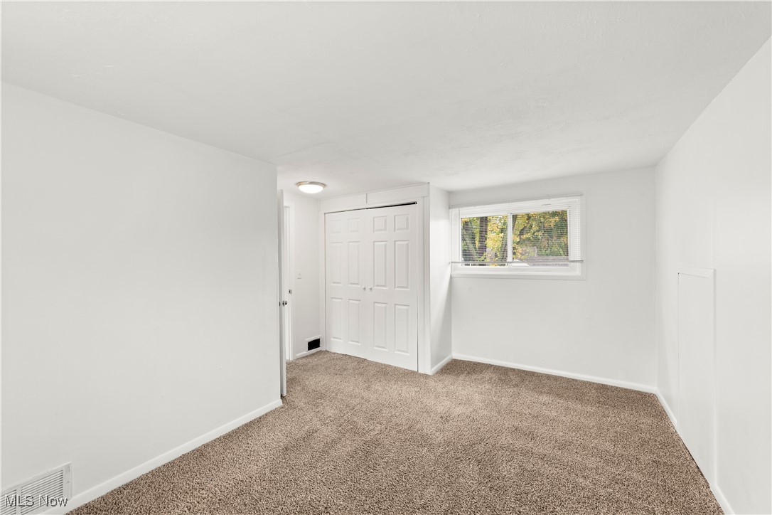 4995 Marigold Road Mentor, OH 44060 - Photo 26 of 33 Bedroom with Neutrally Painted Walls & Fresh Carpeting