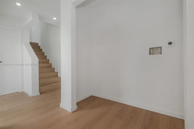 a view of entryway with stairs