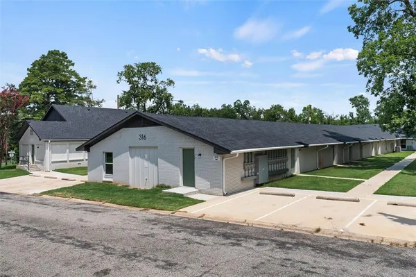 front view of house with a yard