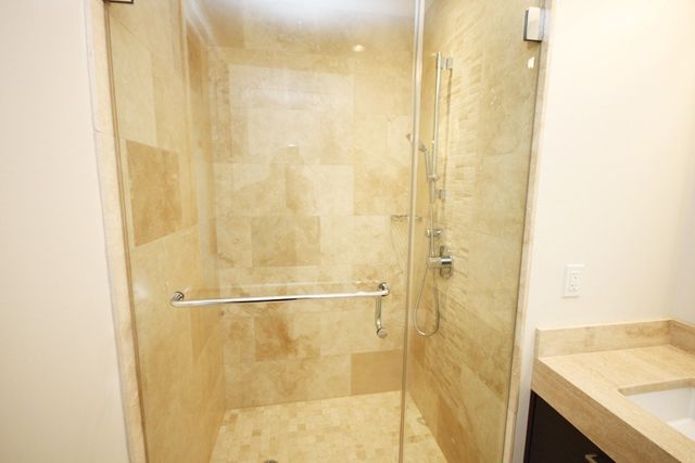 a living room with lots of furniture and white walls