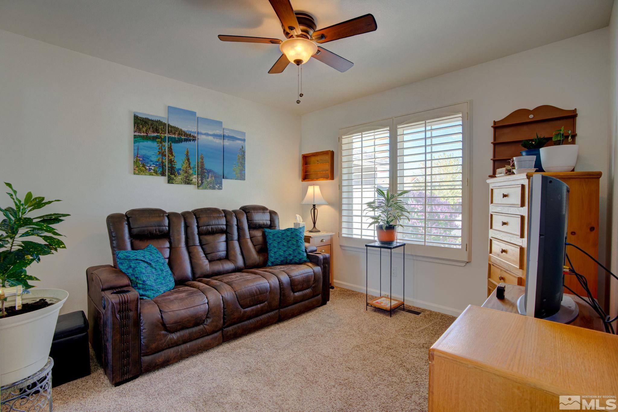 1315 Wrangler Circle Minden, NV 89423 - Photo 22 of 40 a living room with furniture and a window