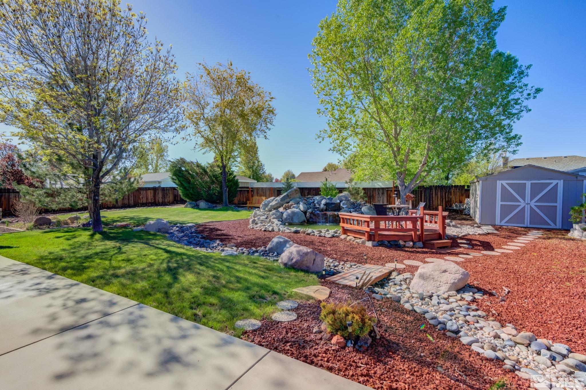 1315 Wrangler Circle Minden, NV 89423 - Photo 29 of 40 a view of a backyard with sitting area