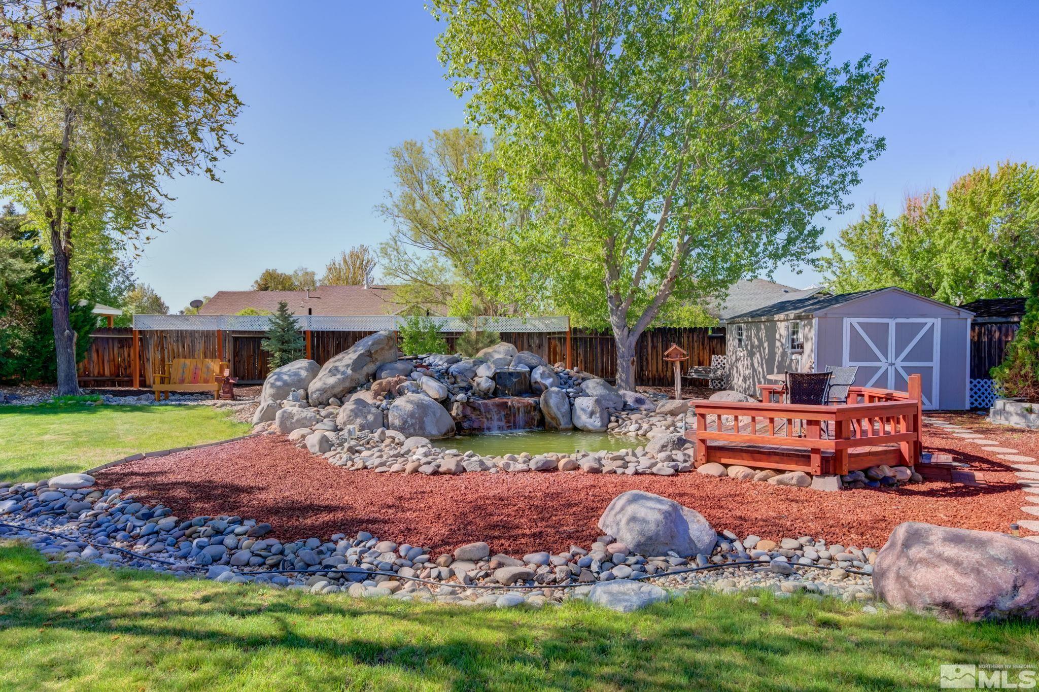 1315 Wrangler Circle Minden, NV 89423 - Photo 33 of 40 a front view of a house with garden