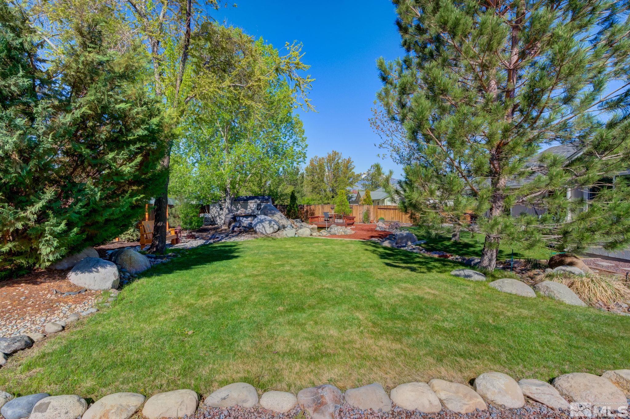 1315 Wrangler Circle Minden, NV 89423 - Photo 36 of 40 a view of yard with green space and bench