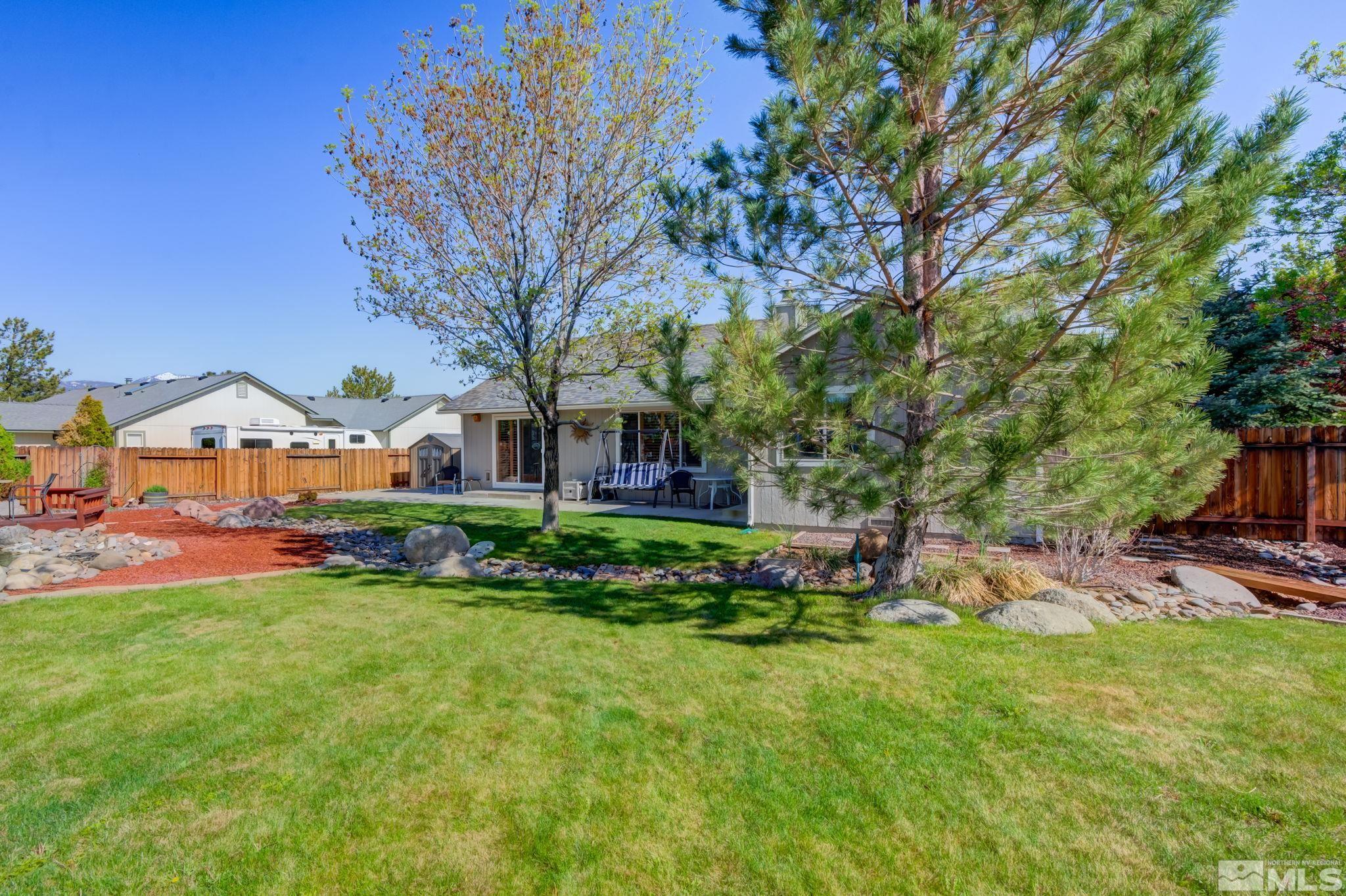 1315 Wrangler Circle Minden, NV 89423 - Photo 37 of 40 a view of house with garden space and trees