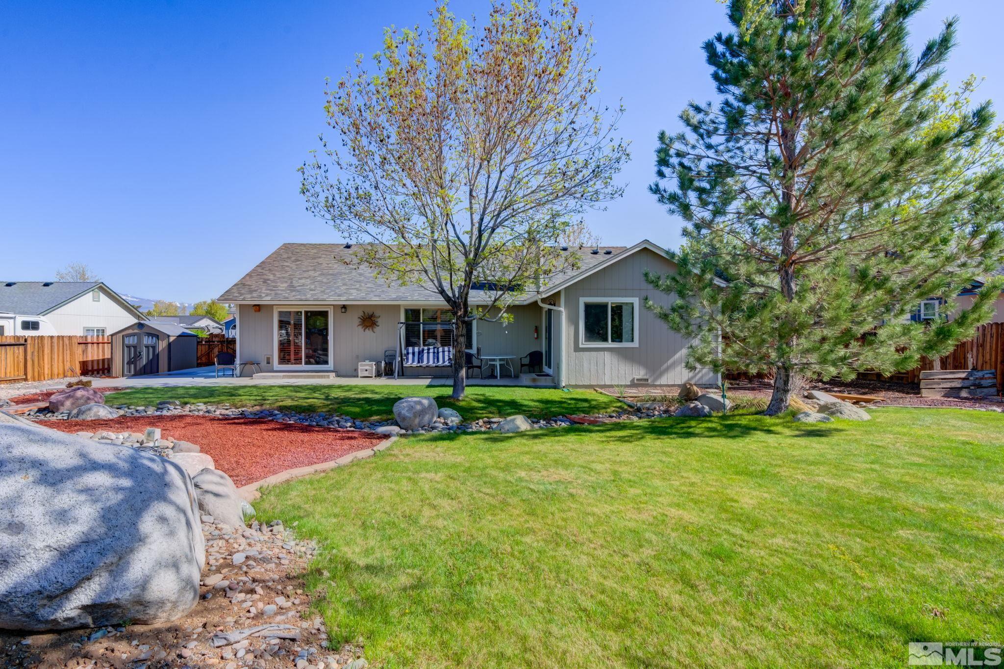 1315 Wrangler Circle Minden, NV 89423 - Photo 38 of 40 a front view of house with yard and green space
