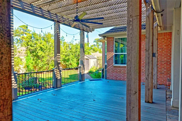 a view of front door and porch with wooden floor