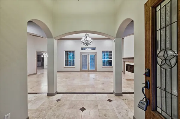 a view of a hallway with entryway