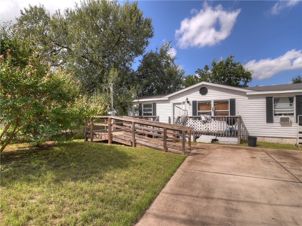 a house view with a garden space