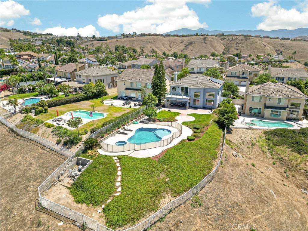 16318 Sun Summit Drive Riverside, CA 92503 - Photo 40 of 47 Back of home showing pool arial shot 16318 sun summit drive, riverside, california 92503