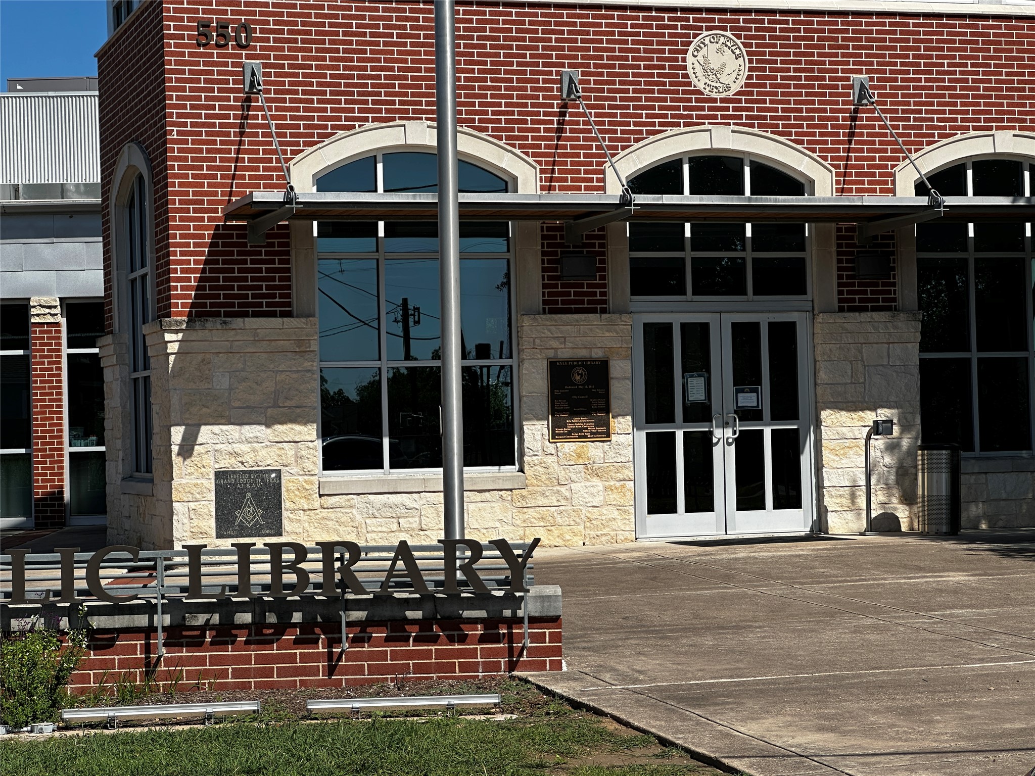 Tbd Scott Street Kyle, TX 78640 - Photo 22 of 30 a front view of a building with glass windows
