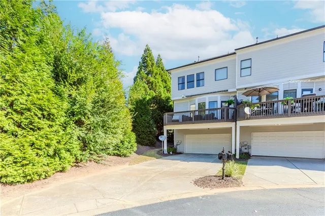 a view of a balcony with furniture